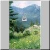 Unterwegs von Kuznice nach Kasprowy Wierch - eine Seilbahngondel bei Myslenickie Turnie, im Hintergrund der Berg Giewont